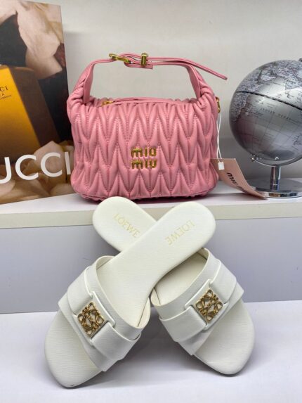 Miu miu bag with siliper Price 100 AED