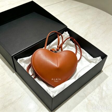 ALAiA bag price 70 AED size 24cm